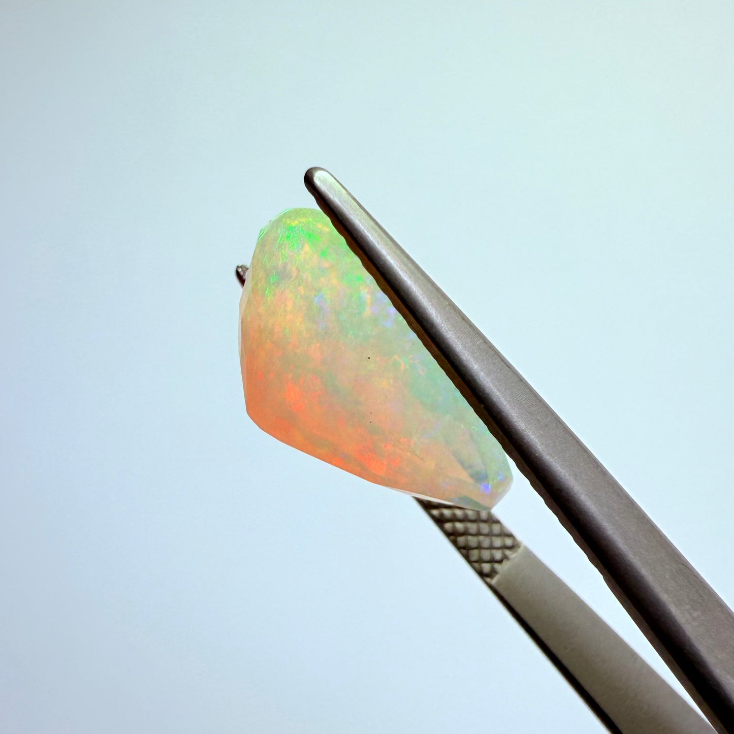 Opal faceted Ethiopia 14x10mm