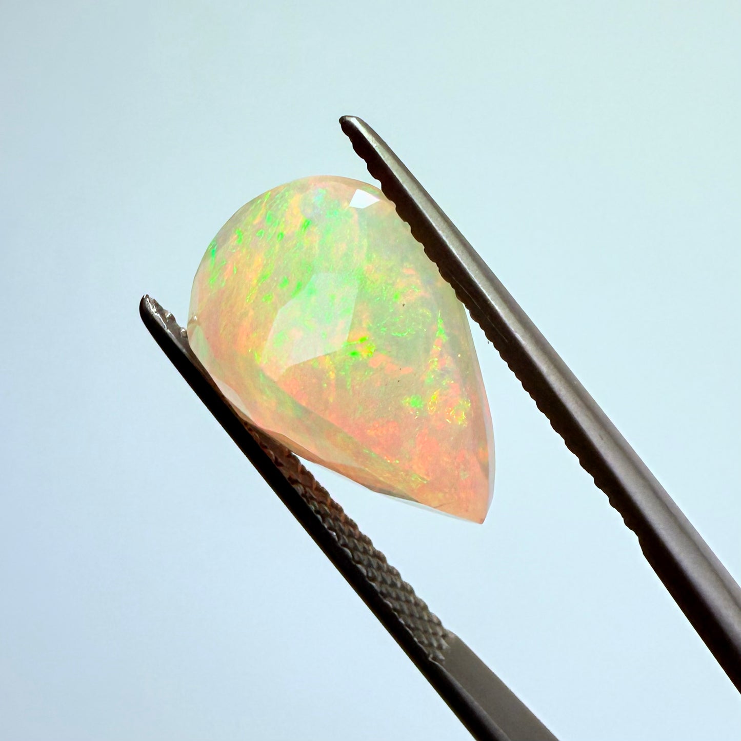 Opal faceted Ethiopia 14x10mm