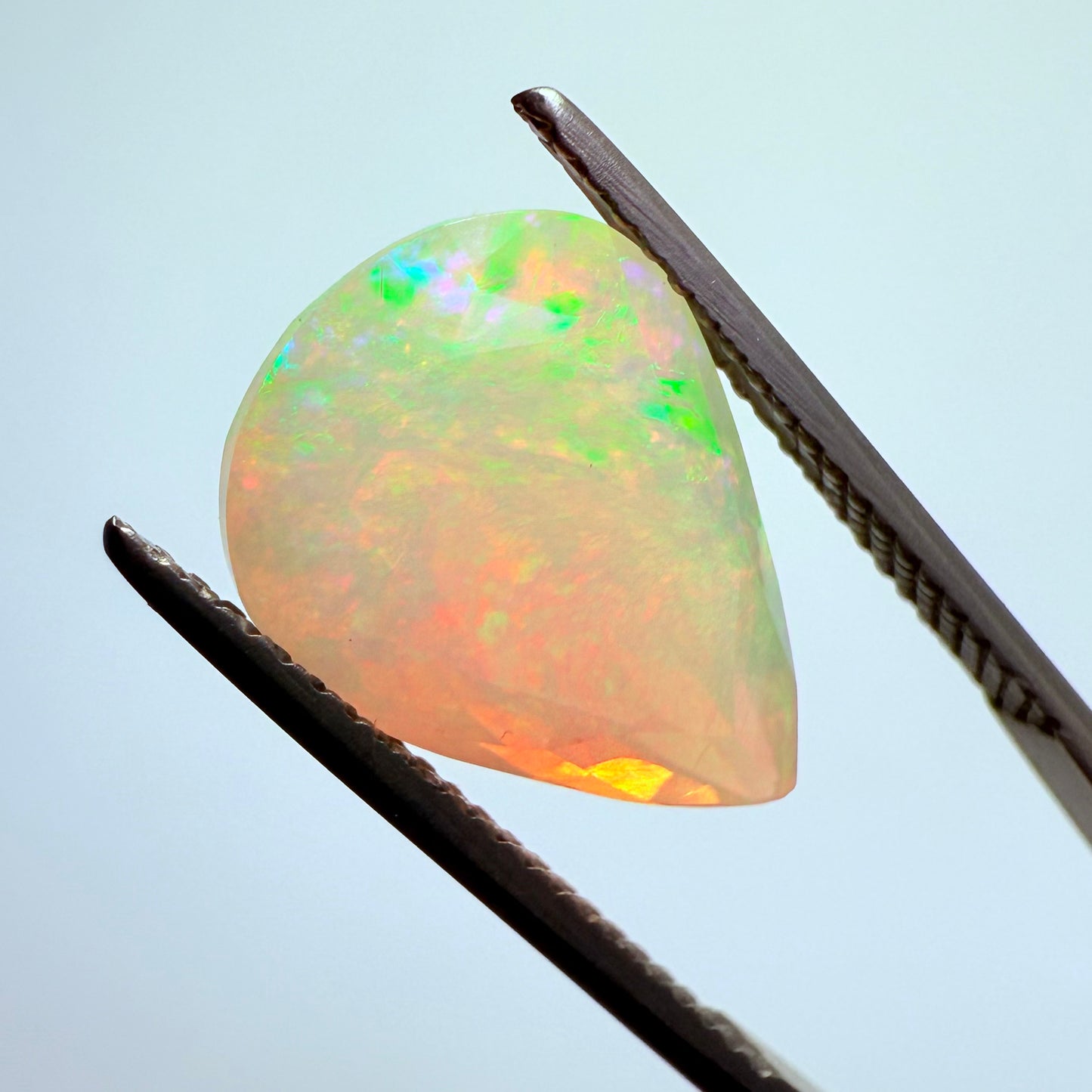 Opal faceted Ethiopia 14x10mm
